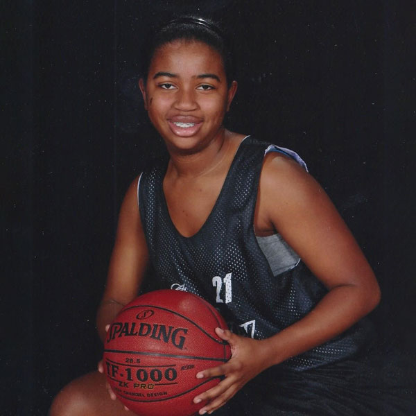 Danielle playing basketball